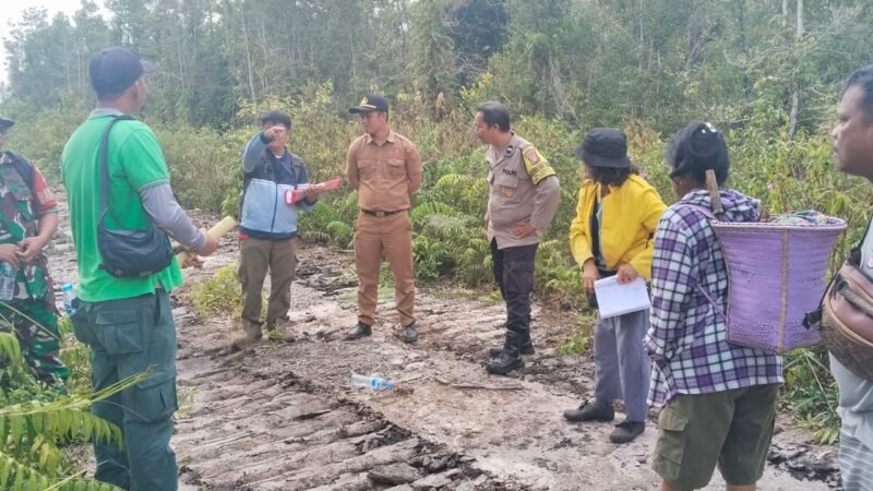 Bhabinkamtibmas Bukit Batu Dampingi Sosialisasi Batas Kawasan TN Sebangau di Marang